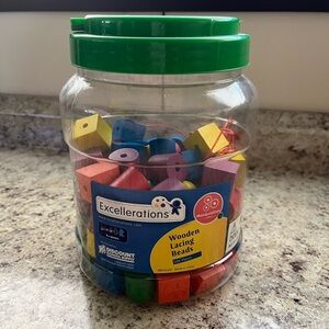 Green-Lid Jar of Multicolor Wooden Lacing Beads